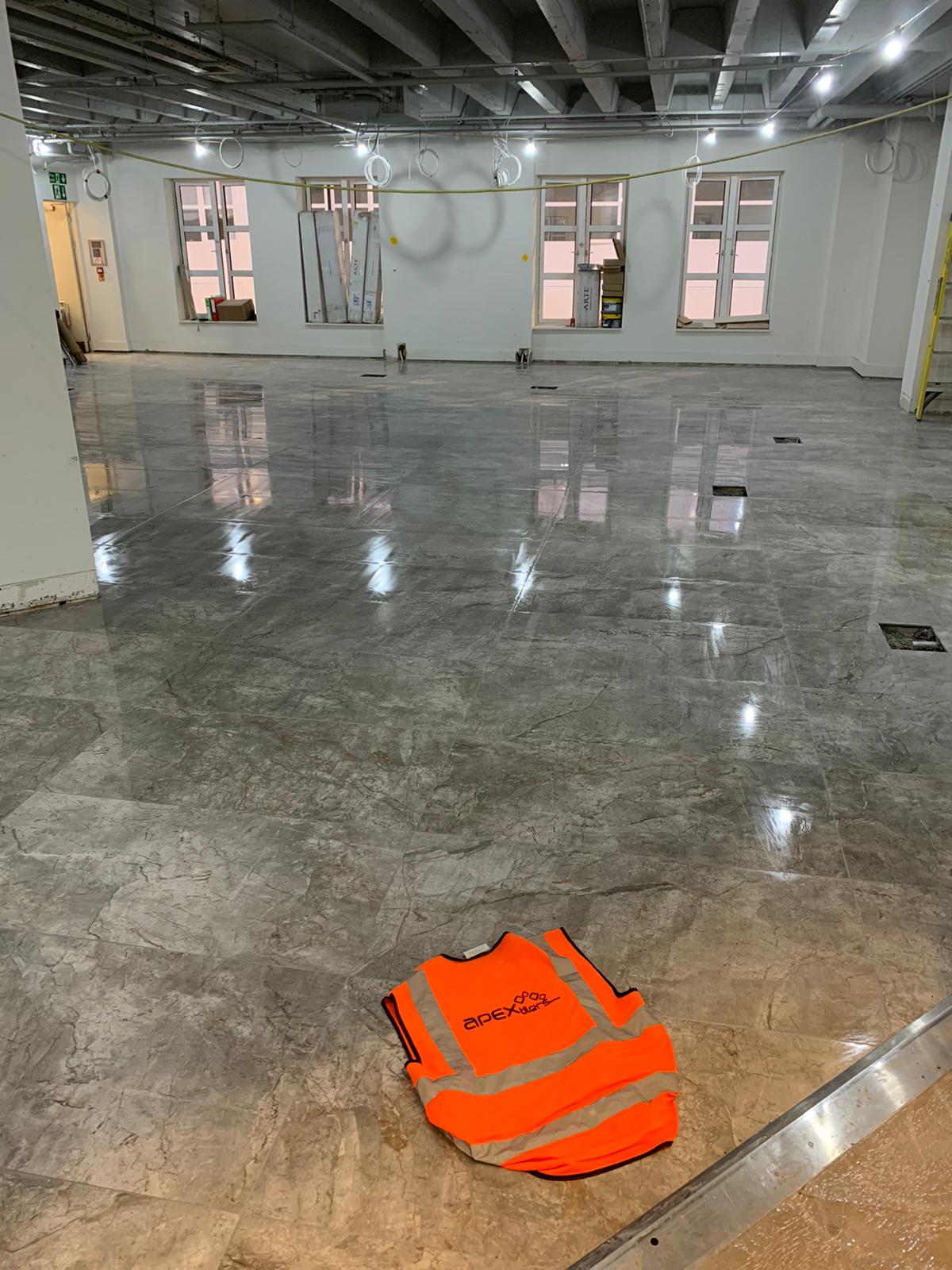 Freshly ground and polished concrete floor in a commercial unit